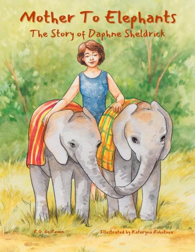 Daphne standing with two elephants