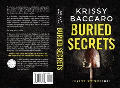 Buried Secrets by Krissy Baccaro. Backside of shovel on dark loose soil with a broken gold necklace to the right. Title words partially covered in soil.